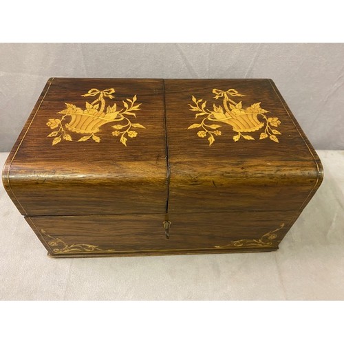 339 - An Edwardian rosewood and satinwood inlaid box, the top inlaid to baskets of flowers, fitted two hin... 