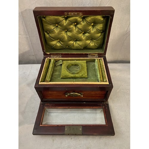 324 - A Victorian mahogany jewellery box with painted decoration to the lid, hinged glass front enclosing ... 