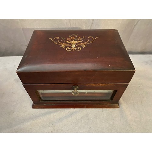 324 - A Victorian mahogany jewellery box with painted decoration to the lid, hinged glass front enclosing ... 