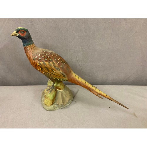 141 - A Spode model of a pheasant and the companion figure of a peahen (broken)