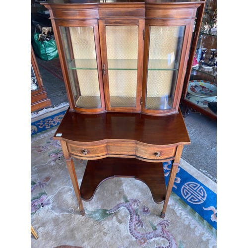 13 - A near matching pair of Edwardian mahogany and satinwood banded cabinets, the upper parts fitted to ... 