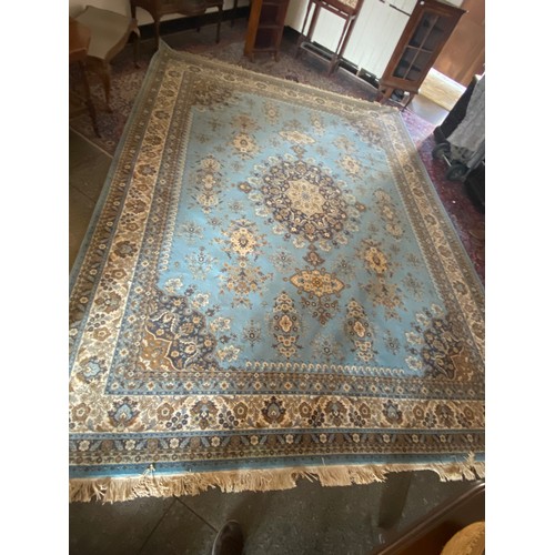 1 - A large Keshan Super carpet, blue and cream ground, fringed - 144in. x 120in. approx.