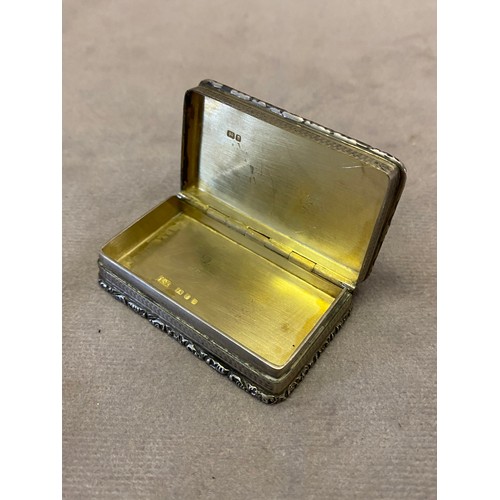 151 - A rectangular silver snuff box with engine turned decoration - London 1970, makers marks for Ramsden... 