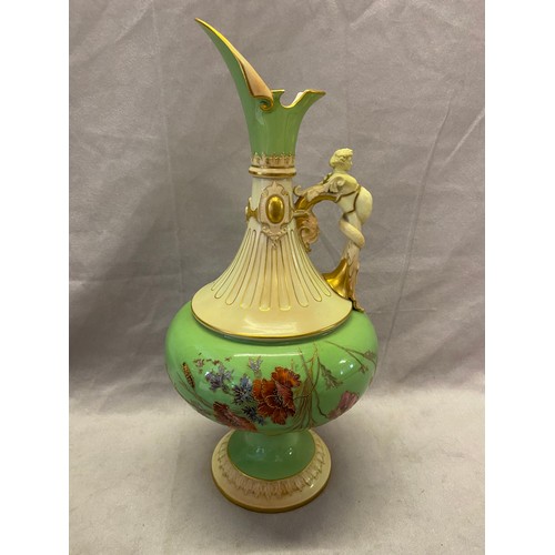 80 - A Royal Worcester figure handled ewer with apple green and blush spout, blush and gilt fluted neck w... 