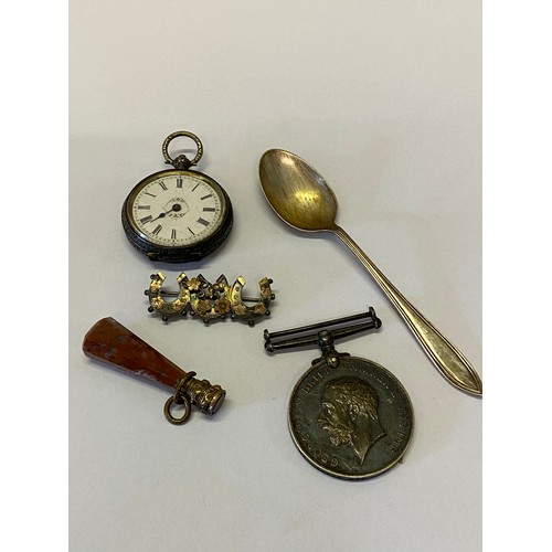 187 - A lady's fob watch, white enamel dial, in a Continental silver case, a First World War medal, a silv... 