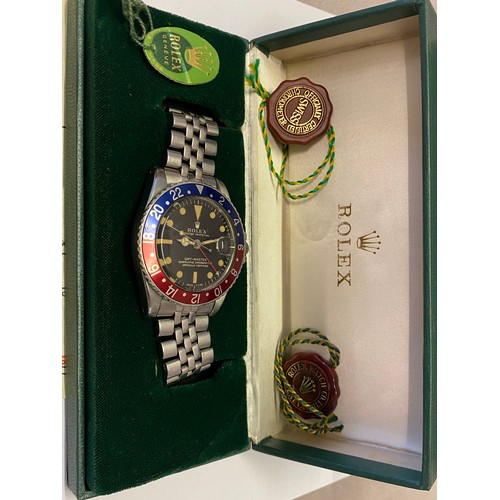 210 - A gentleman's Rolex GMT wristwatch reg.design 1675, 1308253, in a stainless steel case, on a stainle... 