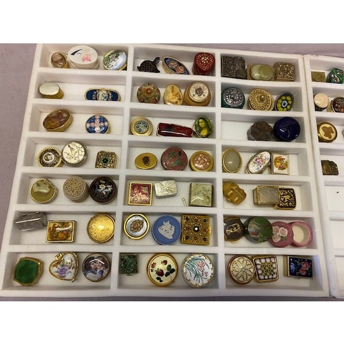 246 - A collection of approximately eighty nine pill boxes including enamel, pottery, brass coated, silver... 