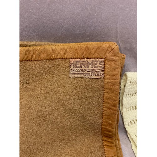 27 - A 1930's Hermes Sellier Paris light brown car blanket with bound edges, a 1930's beige wool rug, fri... 