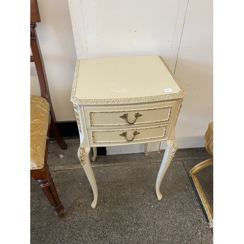 40 - A cream and gilt dressing table fitted mirror, three drawers, on slender legs, - 41 1/2in. wide, a m... 