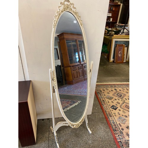 40 - A cream and gilt dressing table fitted mirror, three drawers, on slender legs, - 41 1/2in. wide, a m... 