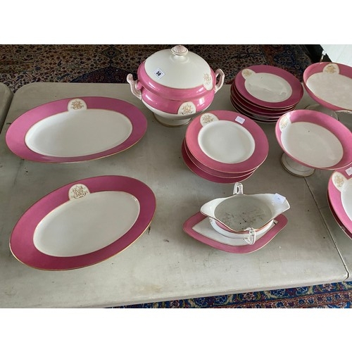 143 - A Continental part dinner service with puce border comprising:- three tall comports, three low compo... 