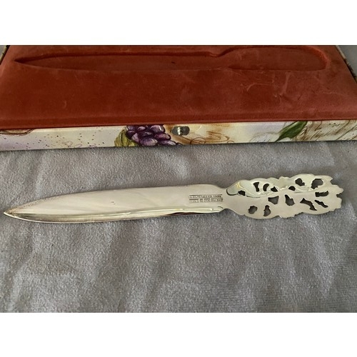 178 - A Norwegian silver letter opener with decorative handle, in fitted box