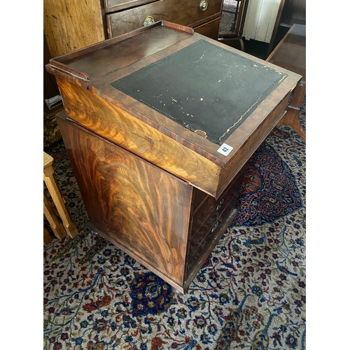 63 - A Victorian mahogany Davenport with 3/4 gallery, pen drawer, hinged lid with tooled leather writing ... 