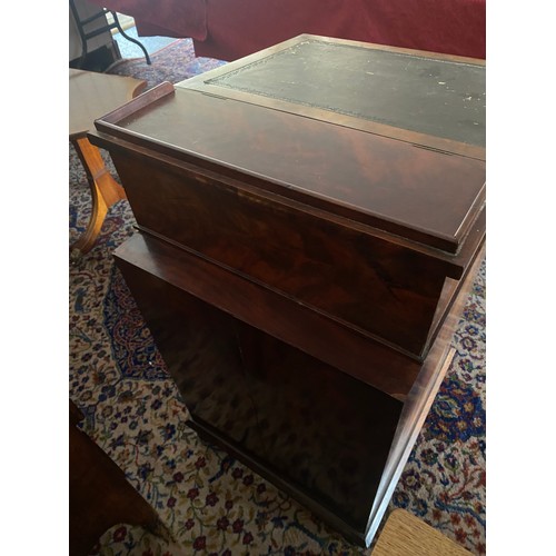 63 - A Victorian mahogany Davenport with 3/4 gallery, pen drawer, hinged lid with tooled leather writing ... 