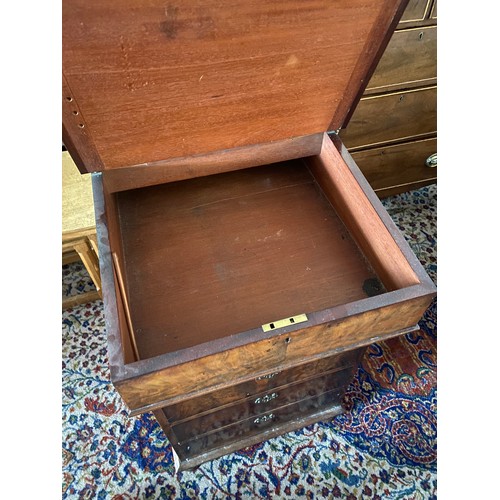 63 - A Victorian mahogany Davenport with 3/4 gallery, pen drawer, hinged lid with tooled leather writing ... 