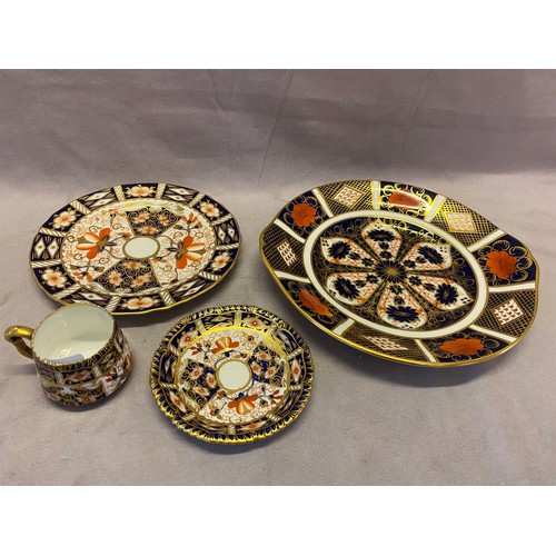 151 - A Royal Crown Derby 1128 Imari pattern bread plate, a tea plate 2481 Imari pattern (af) and a coffee... 