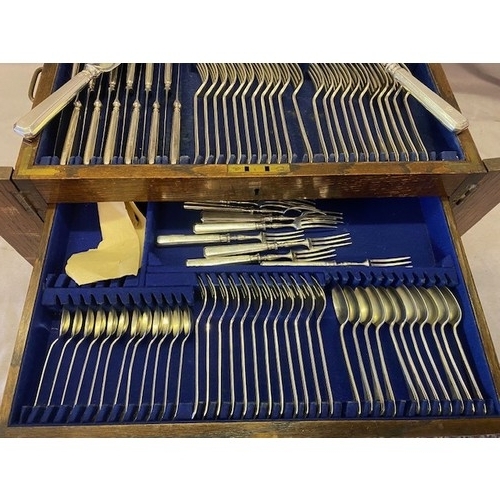 165 - An oak canteen of silver Grecian pattern flatware comprising:- eleven table knives with silver cover... 