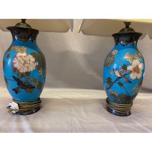 220 - A pair of Cloisonne vases converted to tablelamp bases, blue ground decorated flowers, leaves and bi... 