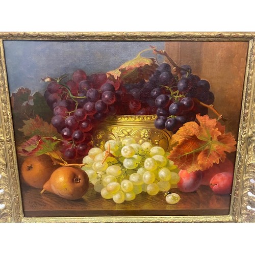 4 - Eloise Harriet Stannard.  A signed and dated oils on canvass - Still life of grapes, pears and plums... 