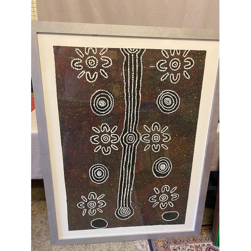 24 - An aboriginal acrylic on canvas, mounted, framed and glazed - 43in. x 30in., together with photograp... 