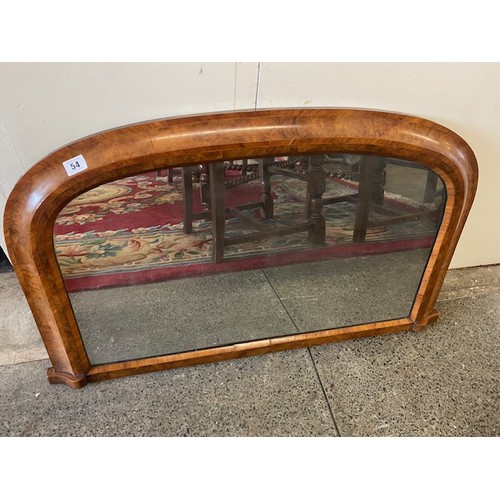 58 - A Victorian overmantel in a walnut veneered and crossbanded frame - 21in. x 35in.