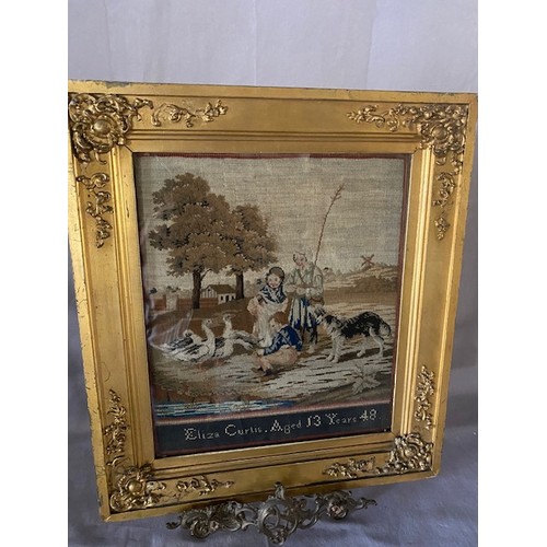 232 - A 19th Century embroidered picture worked by Eliza Curtis Aged 13 Years 1848, depicting three childr... 