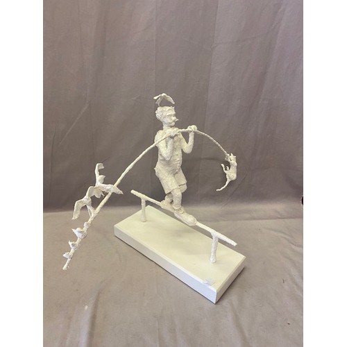 233 - A white papier mache and metal study of an acrobat with balancing bar on a high wire