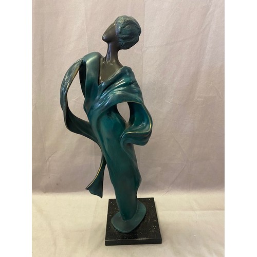 245 - A bronzed resin model of a lady in a green diaphanous dress, on back base - 25in. high