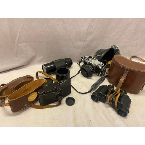 243 - A selection of cameras and binoculars