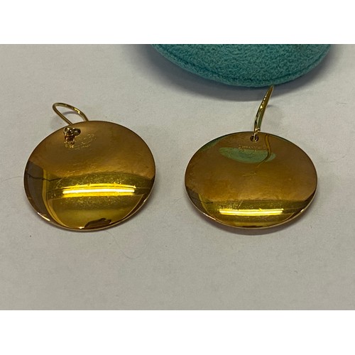 216 - A pair of 18ct. gold  Tiffany disc earrings by Elsa Peretti with pouch and original box