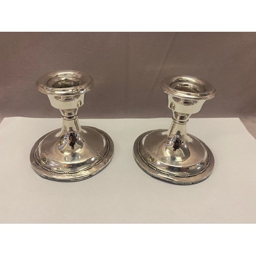 213 - A pair of silver desk candlesticks - Birmingham 1923, makers marks for Henry Williamson Ltd