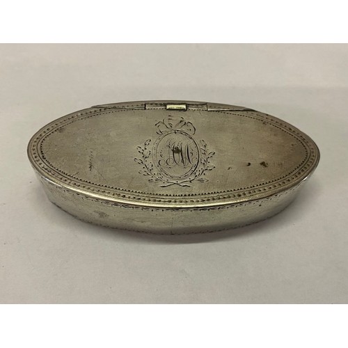 222 - A Georgian silver oval box with engraved monogram to the lid with leaf sprays, makers marks for I.P ... 