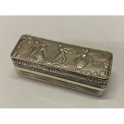 223 - A Continental rectangular silver trinket box, the lid with repousse decoration of figures dancing wi... 