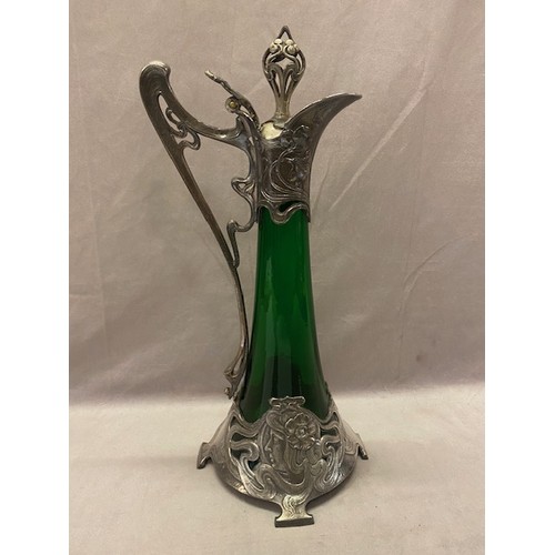 226 - A WMF Art Nouveau pewter and green glass claret jug - 16 1/2in. high