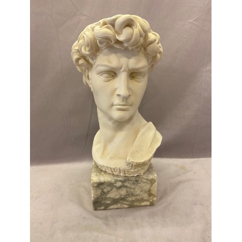 147 - A resin bust - Head and shoulders of a classical male, on granite base - 15in. high