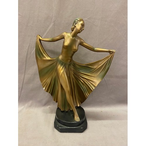 347 - An Art Deco gold painted plaster figure of a lady, on stepped base - 14in. high