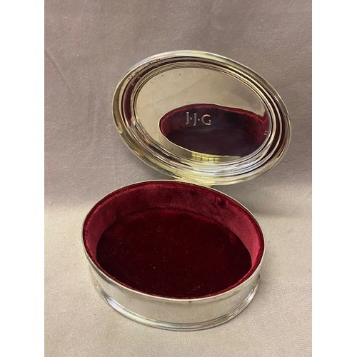 236 - An Asprey oval plain silver trinket box with red velvet lining - Birmingham 2001 - 5in. x 4in.