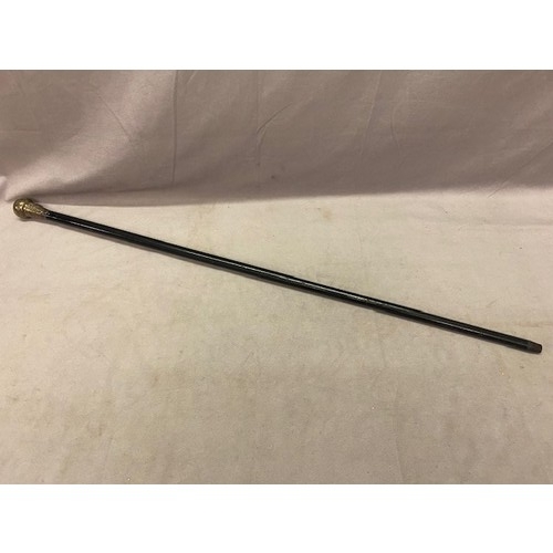 349 - An ebonised cane with plain silver knop