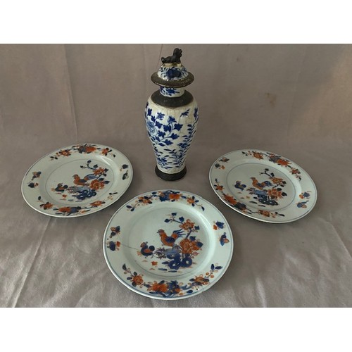 107 - Three Chinese plates decorated in iron red and blue with chickens to the centres - 9in. dia. and a C... 