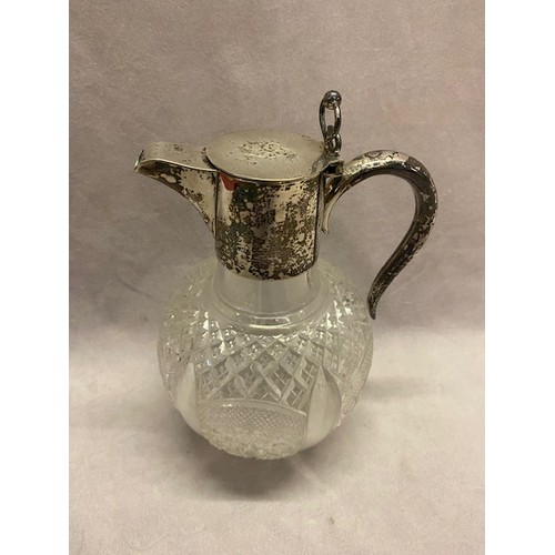 175 - A Victorian cut glass claret jug with plain silver mounts - Birmingham 1876, makers marks for Plante... 