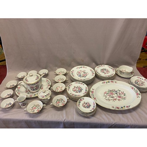 120 - A Limoges part dinner service decorated Oiseaux De Chine pattern comprising:- two graduated meat pla... 