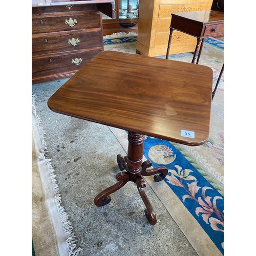 55 - A Georgian mahogany occasional table with square top, on turned column and scroll feet - 18in. wide