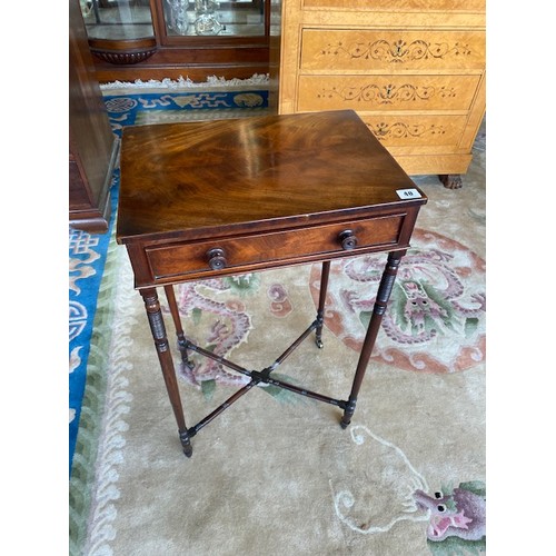 40 - A Georgian mahogany occasional table fitted frieze drawer, on four slender ring turned legs united b... 