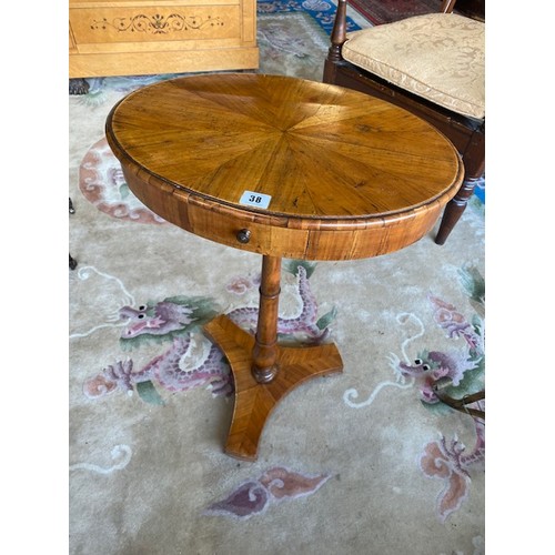 38 - A Continental antique walnut occasional table with oval top, frieze drawer, on turned column and sha... 