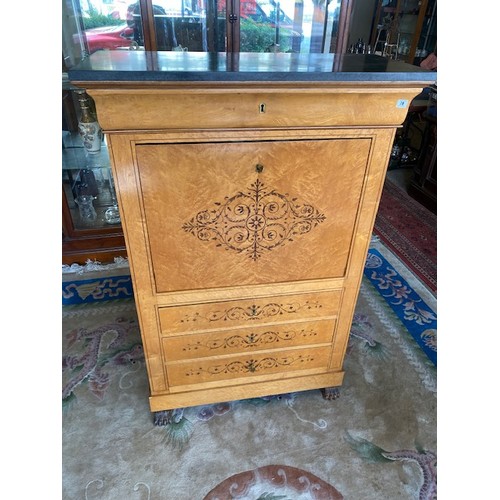 78 - A Continental maple secretaire abattant with ebony inlaid decoration to the hinged fall front, fitte... 