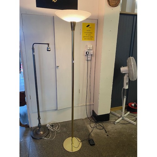 111 - A modern uplighter with white glass shade and brass finished column