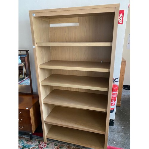 64 - A modern light oak veneered openfront bookcase - 39 1/2in. wide