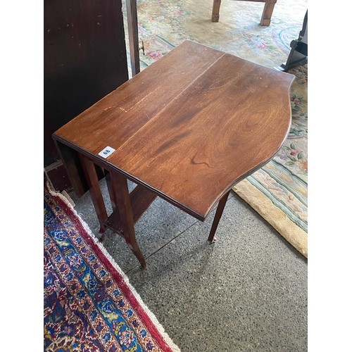 68 - An Edwardian mahogany Sutherland table fitted two shaped drop flaps, on square legs - 24in. wide