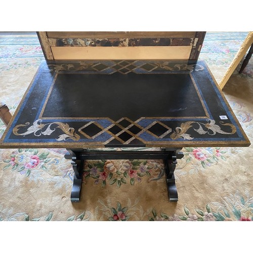 74 - An Italian table, the rectangular top with painted decoration, on shaped trestle ends - 39 1/2in. wi... 