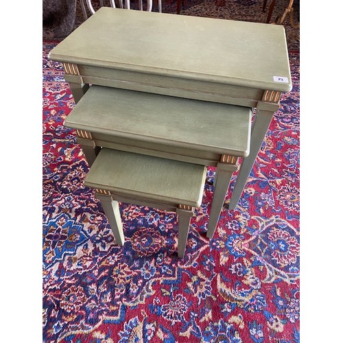 75 - A nest of three Italian green painted occasional tables, the largest - 23in. wide